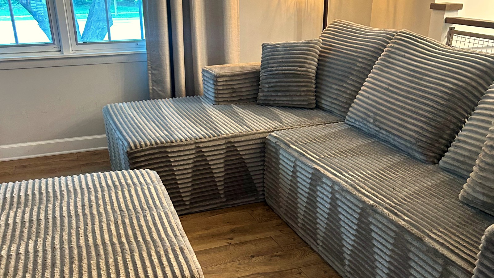 A warm, cared-for living room — the weight you stop carrying